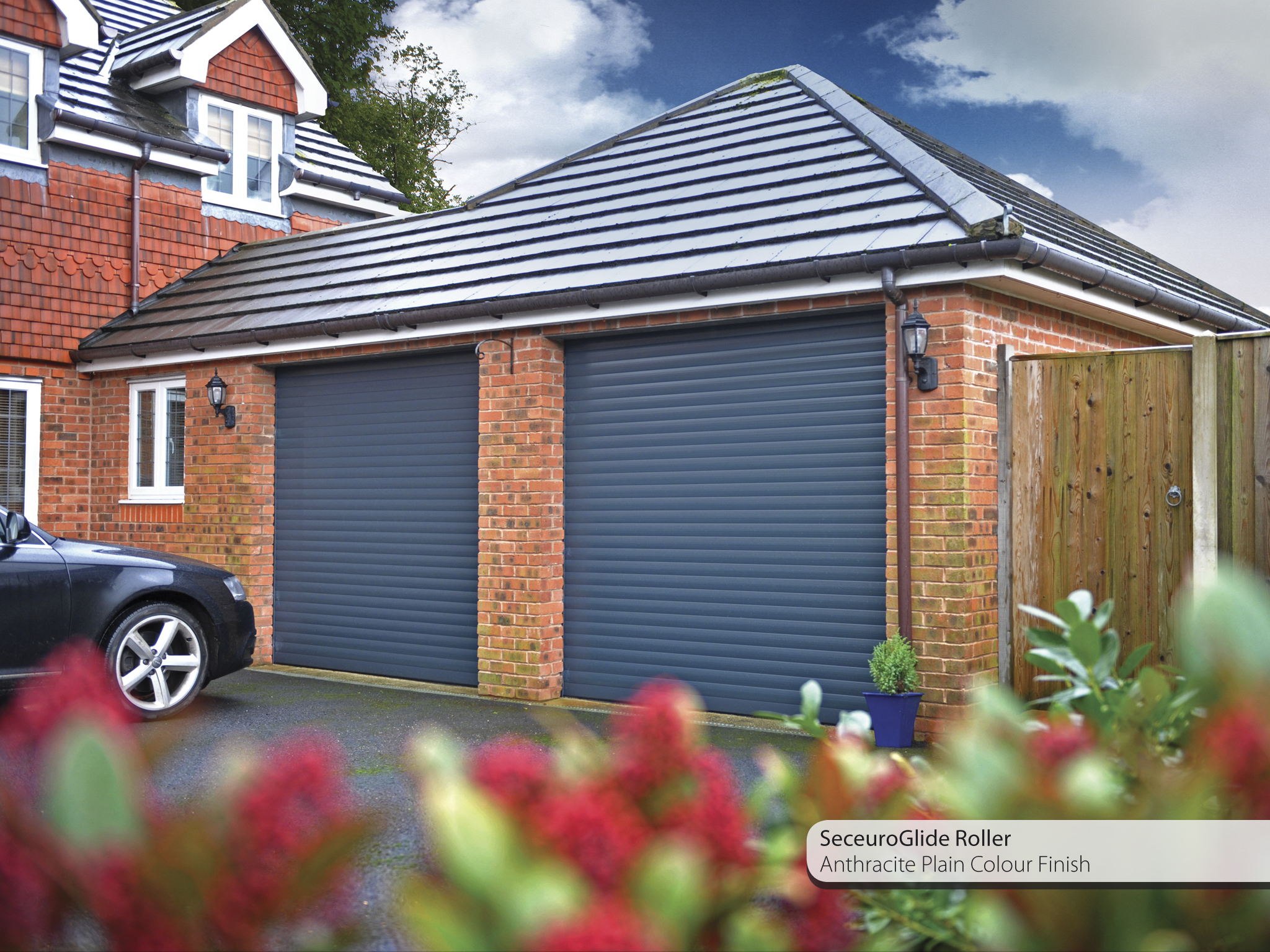 Seceuroglide Classic garage roller doors with remote control operation and a modern anthracite powder coated paint finish.