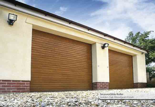Seceuroglide roller shutter garage doors in golden oak
