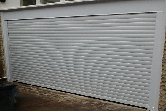 Reveal fixed Seceuroglde Excel roller shutter garage door fitted to a single garage in London.