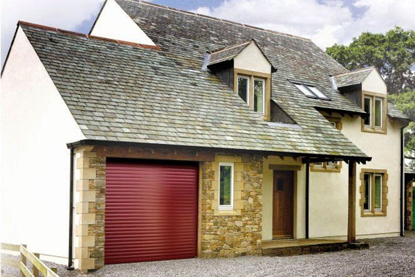 Seceuroglide roller shutter garage door with a burgundy powder coated paint finish.