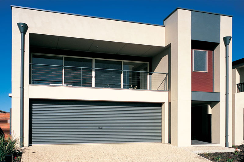 Merlin Grey Gliderol-a-Door fitted to a contemporary garage.